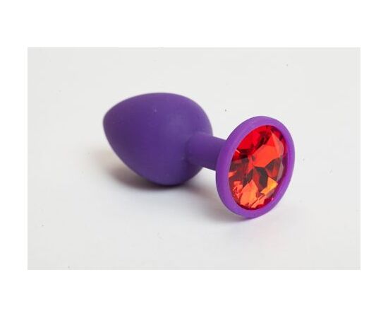 Фиолетовая силиконовая анальная пробка с красным стразом - 7,1 см., фото 